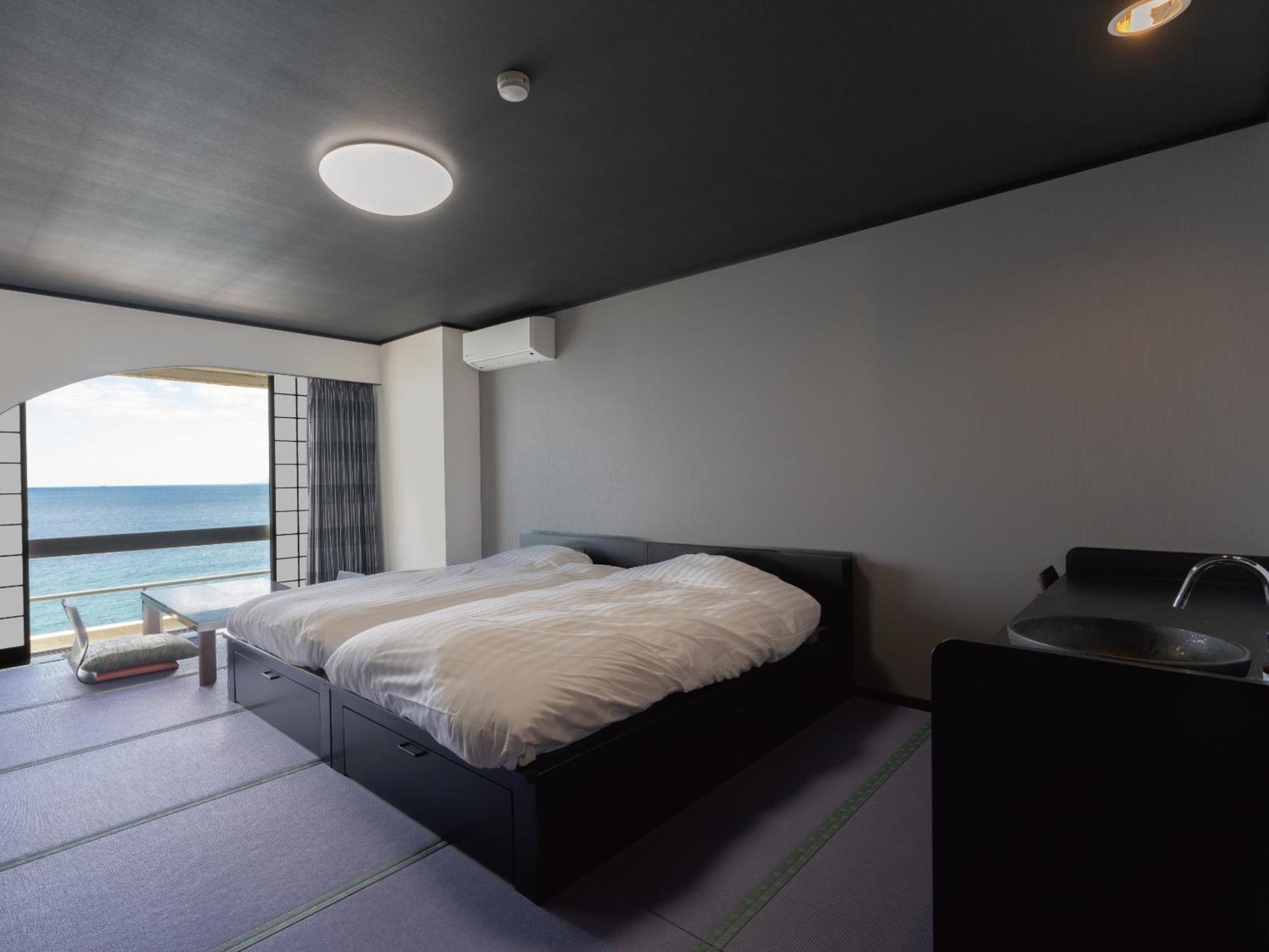 Apartamento estudio de 34 m² en Higashiizu, con 1 baño privado. Habitación foto