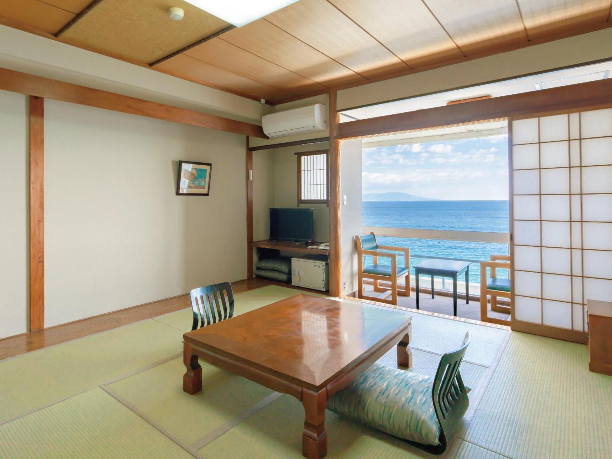 Apartamento estudio de 34 m² en Higashiizu, con 1 baño privado. Habitación foto